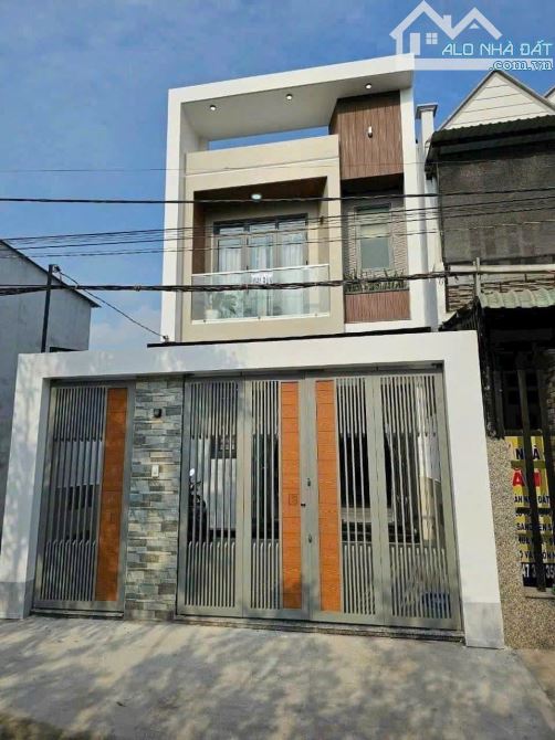 ĐỊnh cư Mỹ. Chính chủ bán căn nhà 5x20m mới xây trong KDC Bửu Long. Trả trước 400 triệu