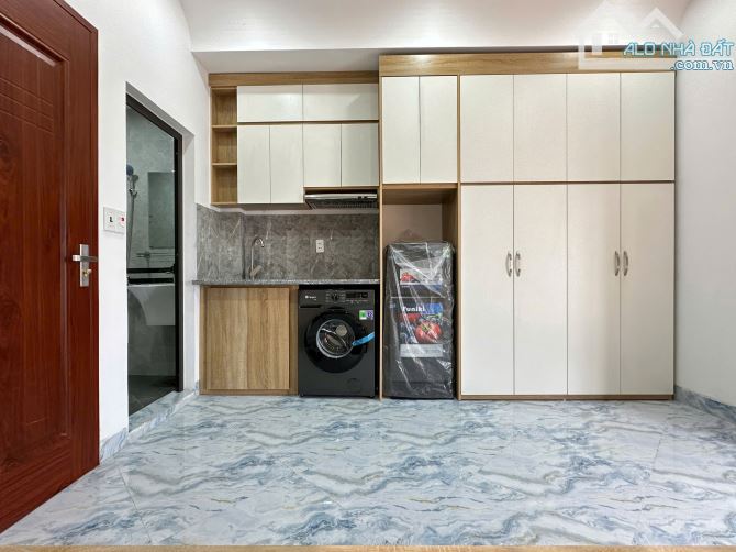 Cho Thuê CCMN 218 Tây Sơn Đống Đa 30m2 Gác Xép Giường Đôi Ban Công Cửa Sổ Giặt Riêng TM