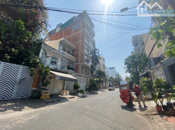 BÁN NHÀ TÂN QUY DT: 6.5x20M, 6 LẦU, GIÁ 27 Tỷ TL