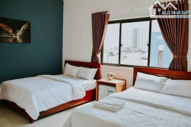 BÁN TÒA NHÀ 4 TẦNG CĂN HỘ KHÁCH SẠN - PHỐ BIỂN MỸ KHÊ - 10 PHÒNG FULL - DÒNG TIỀN 120 TR/