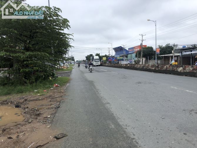Bán 3500m2 đất TMDV mặt tiền đường QL1A,cách ngã 4 Đồng Tâm 2km,Châu Thành,TG