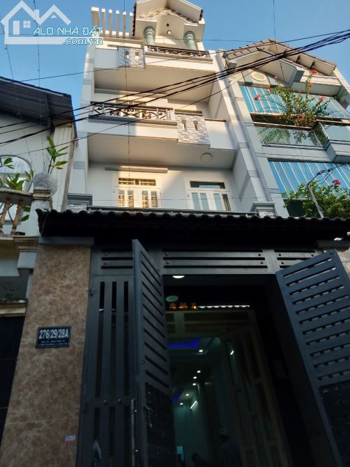 Bán nhà đường lê văn huân f13 tân bình 4×14 trệt 4 lầu nhà mới 100% nội thất cao cấp 8,8 t