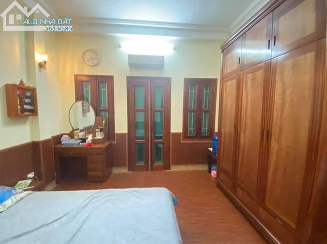 Bán nhà 4 tầng mặt ngõ 12 phố Vũ Thạnh, DT 65m2, Mt 7m, Ô tô vào nhà, giá 11 tỷ - 2