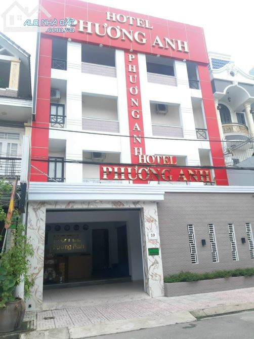 BÁN KHÁCH SẠN GẦN NGÃ BA ÔNG XÃ DĨ AN BINH DƯƠNG, DT 200M2 TRÊT 3 LẦU ,THANG MÁY, 19P - 1