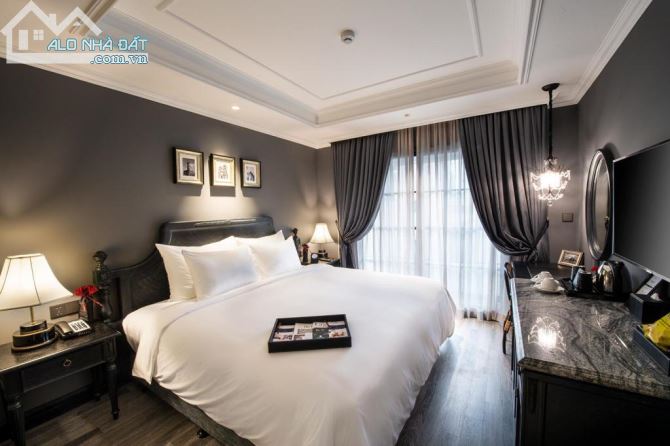 Bán khách sạn 4 sao mặt phố Hàng Bông, 350m2, 12 tầng, MT 9m, giá 460 tỷ. 100 phòng.