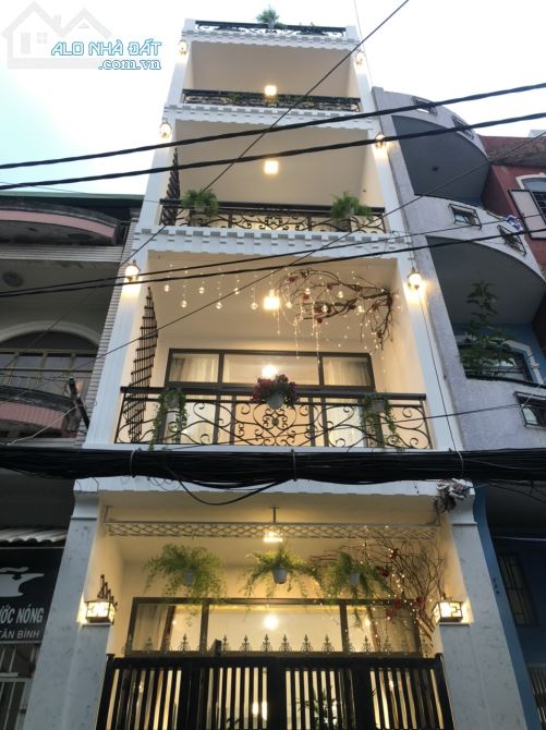 Nhà xinh rẻ 1 trệt 4 lầu đường Đất Thánh Q. Tân Bình TP.HCM