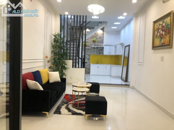 Nhà xinh rẻ 1 trệt 4 lầu đường Đất Thánh Q. Tân Bình TP.HCM - 1