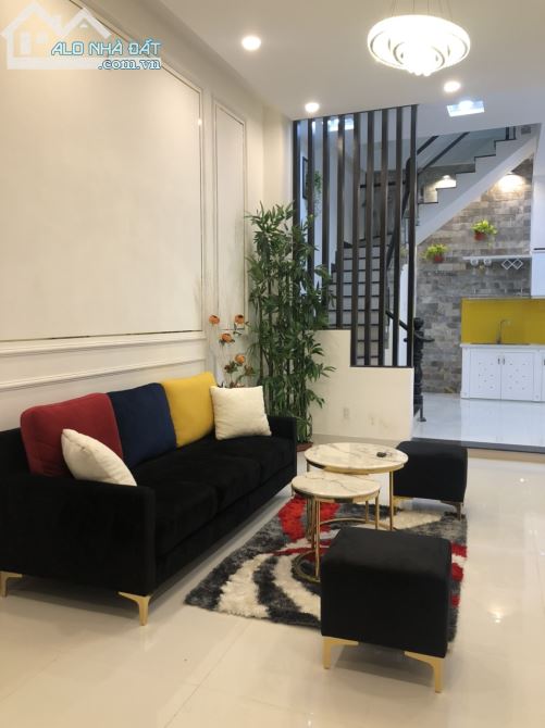 Nhà xinh rẻ 1 trệt 4 lầu đường Đất Thánh Q. Tân Bình TP.HCM - 4