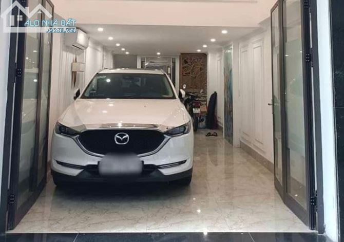 Nhà Nguyễn Chí Thanh Đống Đa – 3 OTO Tránh – Gara – 5 Tầng Thang Máy – 14.8 tỷ. - 2