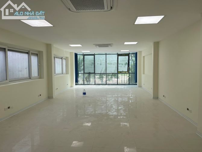 TOÀ VĂN PHÒNG MẶT PHỐ LÊ TRỌNG TẤN 182M2 8 TẦNG, LÔ GÓC, VỈA HÈ RỘNG, KINH DOANH BẤT CHẤP - 1