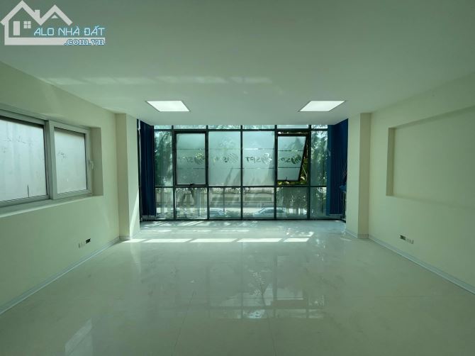 TOÀ VĂN PHÒNG MẶT PHỐ LÊ TRỌNG TẤN 182M2 8 TẦNG, LÔ GÓC, VỈA HÈ RỘNG, KINH DOANH BẤT CHẤP - 2