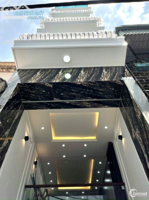 Cho thuê nhà Hoàng Cầu, DT 85m2 x 8 tầng, MT 7m, ngõ 2 ô tô tránh, thông sàn. Giá 60tr/th