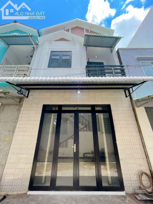 Nhà 1 trệt 1 lầu hẻm 387 đường Trần Nam Phú