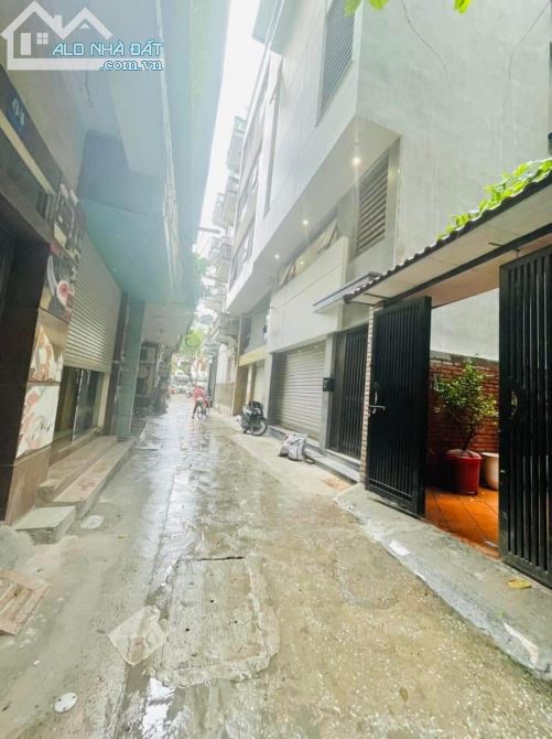 Nhà Hào Nam, Đống Đa ô tô 7 chỗ vào nhà, cách mặt phố 30m 5 tầng dt 50m2 mặt tiền 5,4m