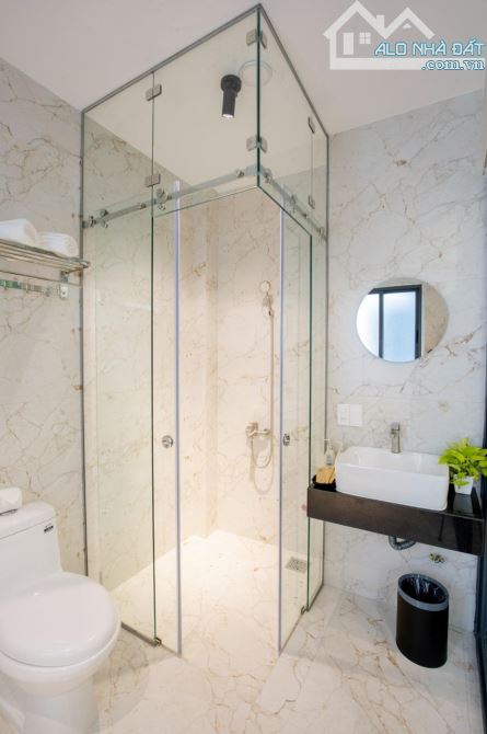Bán khách sạn mới hầm 7 tầng mặt tiền khu D - XVNT - 6.3x17m - HDT thật 125tr/th (5%/năm) - 13
