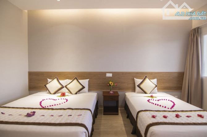 Bán resort mặt tiền đường Lạc Long Quân, diện tích 1.8 hec mặt biển giá 24tr/m2 - 2