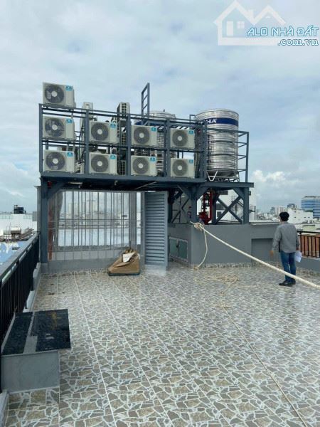 bán căn hộ dịch vụ 6 lầu hẻm 791 Trần xuân soạn phường tân hưng Q7. Dt 7x20m - 2