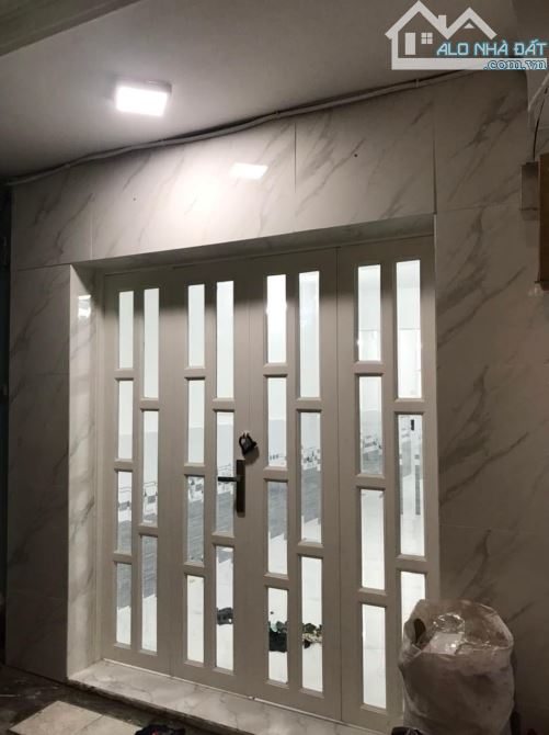 NHÀ ĐẸP- SỔ HỒNG RIÊNG - CẠNH LOTTE MART -NGUYỄN THỊ THẬP (3 x 10m)- 2 TẦNG BTCT-NHỈNH 2Ty