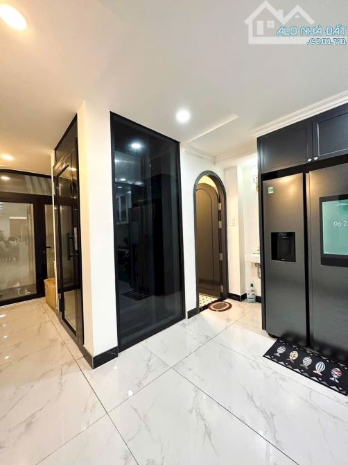 nhà đẹp xách vali vào ở liền Phan Xích Long,P2,PN. 4x18m 4 tầng - thang máy. 14,9 tỷ - 3