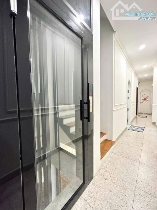 nhà đẹp xách vali vào ở liền Phan Xích Long,P2,PN. 4x18m 4 tầng - thang máy. 14,9 tỷ - 5