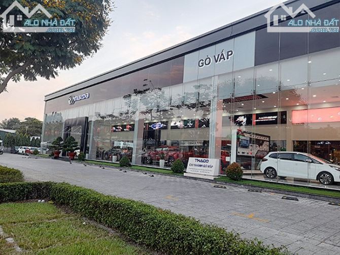 BÁN GẤP SHOWROOM ÔTÔ MẶT TIỀN QUỐC LỘ 1A QUẬN 12 -  32Mx39M. GIÁ 26.8 TỶ.