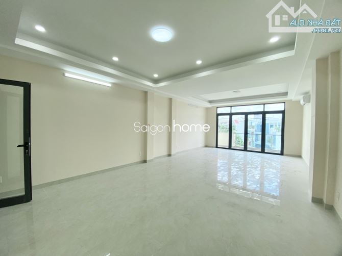 Tòa nhà mới xây 5 lầu trống suốt 400m2 - Thang máy, máy lạnh . Giá 50 triệu - 2