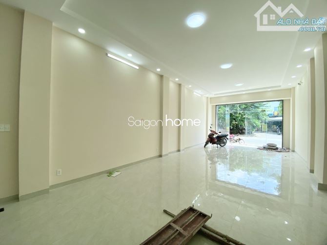 Tòa nhà mới xây 5 lầu trống suốt 400m2 - Thang máy, máy lạnh . Giá 50 triệu - 5