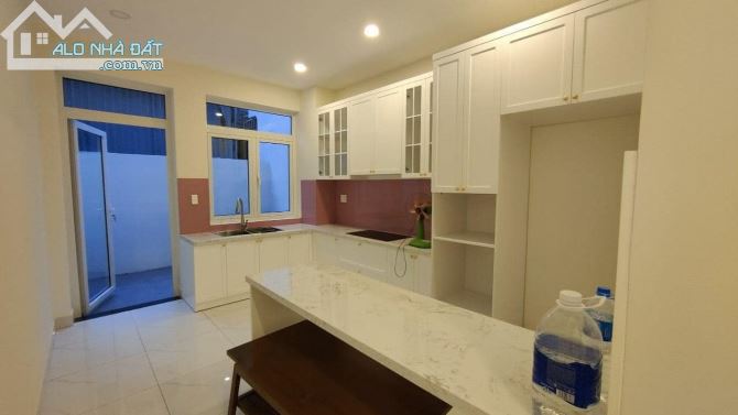 bán gấp nhà mới , HXH thông đỗ cửa Nguyễn Huy Tự P. Đakao Q.1 4 tầng BTCT 49m2, 2PN,19 tỷ - 2