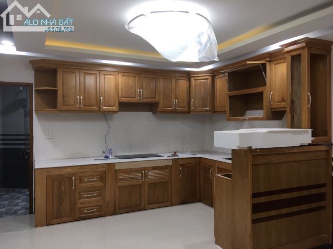 Bán nhà HXH 440/ Thống Nhất, DT 4,68x18m, 4 tầng, DCT 27 triệu, giá 8,2 tỷ - 2