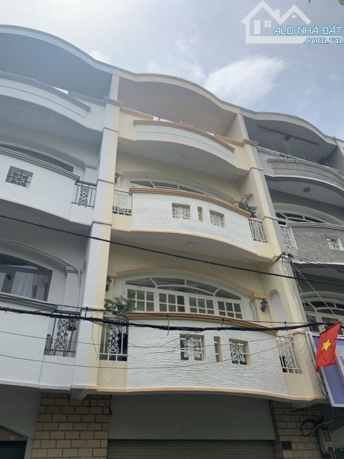 Cho thuê nhà 4 tầng hẻm xe hơi 10F Trần Nhật Duật, Quận 1 - Giá 35 triệu - 1
