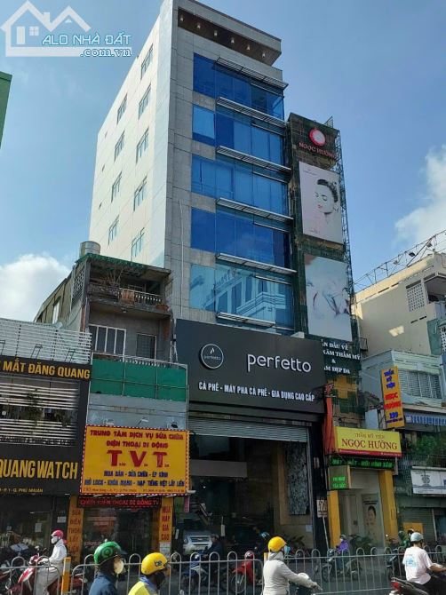 Bán nhà building VP MT ngay Etown Cộng Hòa. DT 8x30m (240m2 đất) H7L 1200m2 sàn giá 55 tỷ