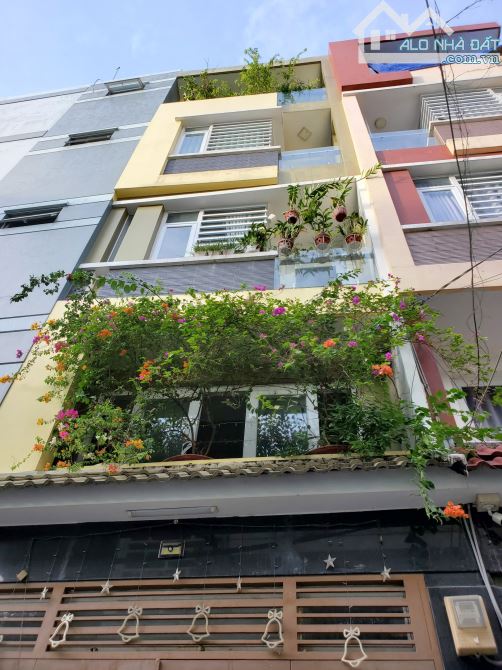 Bán Nhà 2 Mặt Tiền Phan Đăng Lưu 4x23m 5 tấm 10 PN,Xe Hơi Đỗ Trong Nhà 12 Tỷ TL
