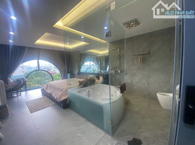 MẶT PHỐ BÙI HUY BÍCH ĐỐI DIỆN QUẬN ỦY VỈA HÈ 7M 6 tầng thang máy 68m mt 5m chỉ 14 tỷ. - 2