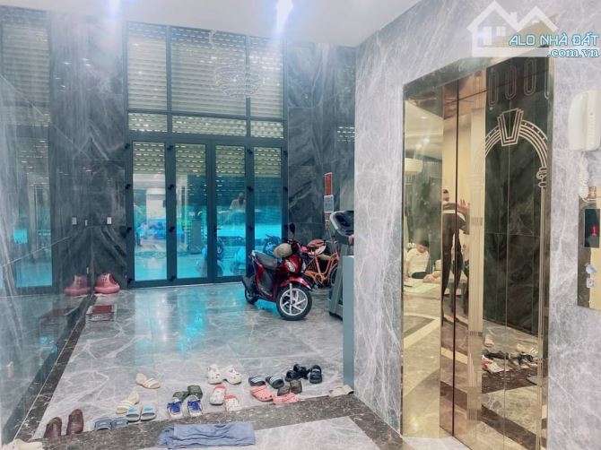 MẶT PHỐ BÙI HUY BÍCH ĐỐI DIỆN QUẬN ỦY VỈA HÈ 7M 6 tầng thang máy 68m mt 5m chỉ 14 tỷ. - 4