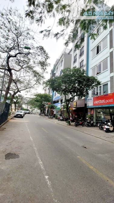 BÁN NHÀ MẶT PHỐ 1 MẶT NGÕ 60 TỶ 130m 9 TẦNG MT 8.6m 2 VỈA HÈ GARA Ô TÔ QUAN HOA CẦU GIAY