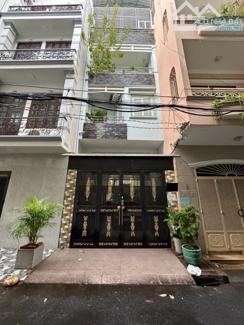 BÁN NHÀ 2 MẶT TIỀN - 4 TẦNG NGUYỄN HỒNGN ĐÀO - HXH THÔNG RA TRƯỜNG CHINH- CHỈ 11 TỶ 9