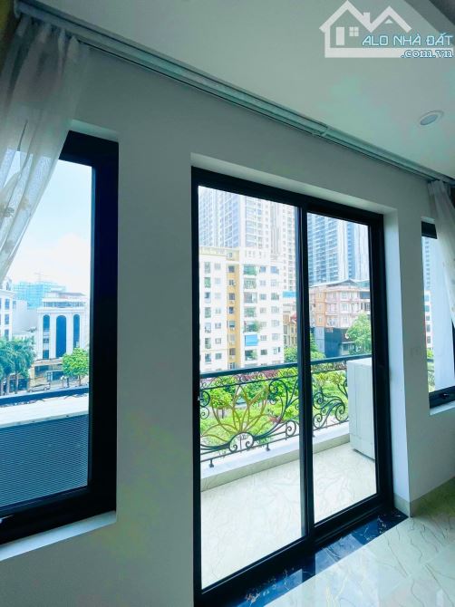 NHÀ MẶT PHỐ NGUYỄN HOÀNG 64/80M2 MT 5 8 TẦNG VỈA HÈ ĐÁNH BÓNG - 2