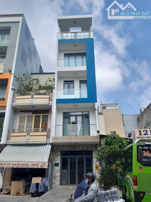 Bán nhà đường Số 23 P11 Q6. Hợp đồng thuê 40 triệu/tháng. DT: 4x31m (124m2) lửng 4 tấm.