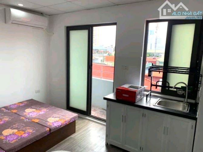 Bán Tòa nhà CHDV Thái Thịnh 92m2 - 7 tầng thang máy - Ô tô 15m - 4