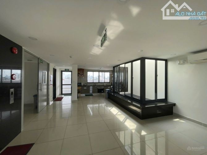 Building 102-102A Nguyễn Văn Đậu, Bình Thạnh. DT: 404m2 - Hầm, 8 Tầng - HĐ Thuê 600 Tr/Th - 6