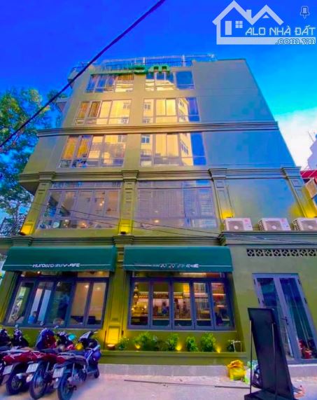 Bán tòa nhà hướng sân bay ngay Nguyễn Văn Trỗi (hầm 8 tầng) - TN 130 triệu, DT 135m2, giá