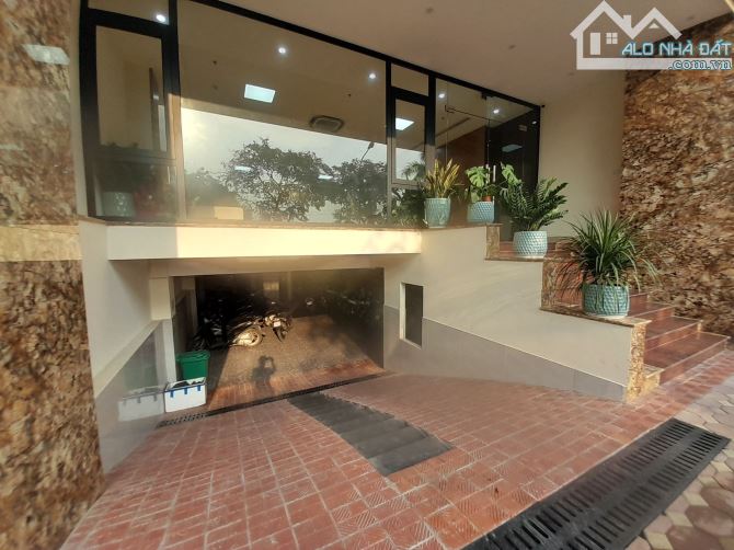 Bán tòa Văn Phòng đường Nguyễn Hữu Thọ, 9 tầng, 160m2, 3 Ô tô tải tránh, MT 9m, giá 98 tỷ