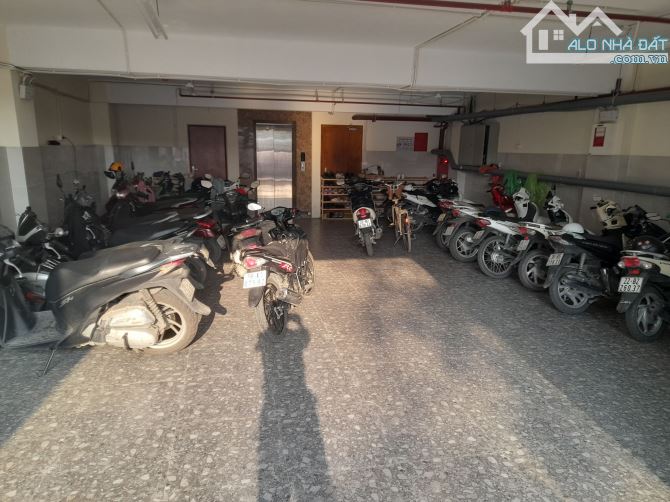 Bán tòa Văn Phòng đường Nguyễn Hữu Thọ, 9 tầng, 160m2, 3 Ô tô tải tránh, MT 9m, giá 98 tỷ - 1