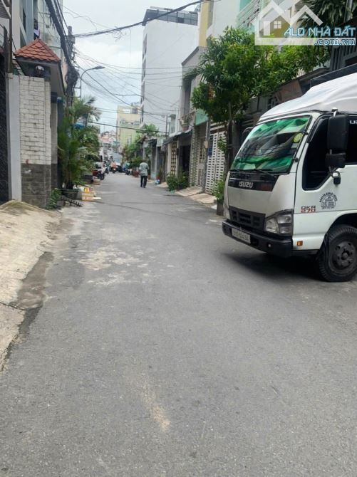 Hẻm xe tải tô hiến thành kết cấu hầm 6 lầu có thang máy thu nhập 100tr/tháng quận 10 - 1