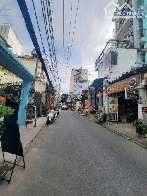 Tòa nhà 4 tầng mặt tiền đường xe hơi thông 142 Nguyễn Thị Thập Tân Quy Quận 7, 118m2 24 tỷ - 2