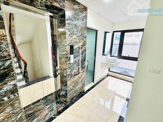 Bán tòa nhà khu Nguyễn Cơ Thạch. Dt 110m2, 8 tầng, MT 6m. Thang máy. Cho thuê 90tr/th. - 2