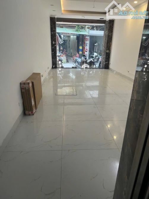 Bán nhà phố Tây Sơn, Đống Đa, ô tô tránh, tiện kinh doanh 7 tầng 46m2 giá 19.8 tỷ