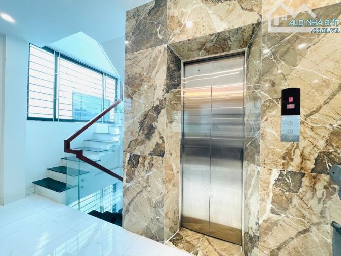 BÁN NHÀ PHỐ ĐẶNG VĂN NGỮ 6 TẦNG THANG MÁY 10M RA PHỐ - 1