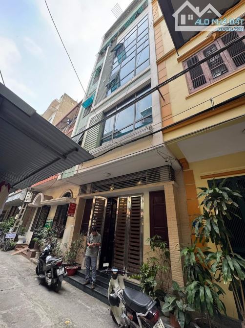 Bán Nhà Ngõ 84 Nghĩa Tân 30m2 x6 tầng OTO Đôc Cửa Giá 8.75 tỷ - 1