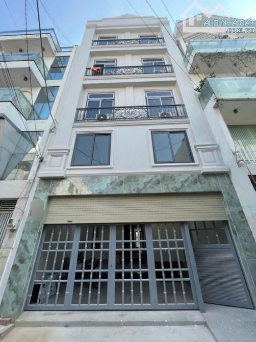BÁN NHÀ 8 TẦNG - NƠ TRANG LONG P12 BÌNH THẠNH - NGANG 6.3M - HẺM XE HƠI - DÒNG TIỀN